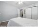 This bedroom has a ceiling fan, double door closet, and an en suite bathroom at 1011 Stevedon Ct, Plainfield, IN 46168