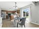 Eat-in kitchen area with stainless steel appliances and a view to the back yard at 1011 Stevedon Ct, Plainfield, IN 46168