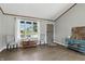 Bright living room with large windows and comfortable seating at 1011 Stevedon Ct, Plainfield, IN 46168