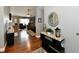 Entryway with hardwood flooring that transitions into a view of the cozy living area at 10173 Stillwell Dr, Avon, IN 46123