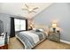 Well-lit main bedroom with neutral tones, cozy carpet, and contemporary decor at 10173 Stillwell Dr, Avon, IN 46123