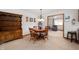 Inviting dining room features a wood table, hutch, and a chandelier at 114 Asbury Dr, Anderson, IN 46013