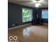 Bright living room with windows and a ceiling fan at , Mooresville, IN 46158