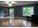 Spacious living room featuring hardwood floors and natural light from the window at , Mooresville, IN 46158