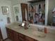 Bathroom featuring a double sink vanity, wall decor, and playful shower curtain at 1327 Goldfinch Dr, Carmel, IN 46032