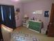 Bedroom features a window, curtains, and green painted storage drawers at 1327 Goldfinch Dr, Carmel, IN 46032