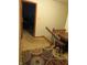 Hallway with carpet, with wooden furniture, artwork, and an area rug at 1327 Goldfinch Dr, Carmel, IN 46032
