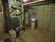 Basement utility room with water heater, HVAC system, and concrete walls at 1327 Goldfinch Dr, Carmel, IN 46032