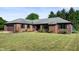Beautiful brick home with an attached garage and well manicured front lawn at 180 Wellington Pkwy, Noblesville, IN 46060