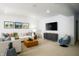 Finished basement offers a bright living space with modern decor and carpeted floors at 19796 Chatham Shore Ln, Westfield, IN 46074