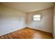 Bright bedroom with hardwood floors and one window at 2520 Tesh Dr, Indianapolis, IN 46203