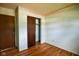 Bedroom with hardwood floors and sliding closet doors at 2520 Tesh Dr, Indianapolis, IN 46203