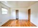 Bright bedroom with hardwood floors and closet at 2520 Tesh Dr, Indianapolis, IN 46203