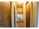 Hallway with multiple closet doors and carpet flooring at 2520 Tesh Dr, Indianapolis, IN 46203