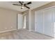 Cozy bedroom with walk-in closet, carpet flooring, and a ceiling fan at 341 Thistlewood Dr, Greenfield, IN 46140