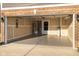 Well-lit and clean garage featuring an epoxy floor and ample space for storage at 341 Thistlewood Dr, Greenfield, IN 46140