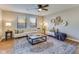 Cozy living room featuring stylish decor, hardwood floors, and comfortable seating at 341 Thistlewood Dr, Greenfield, IN 46140