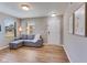 Bright living room featuring hardwood floors and comfortable seating with lots of light at 341 Thistlewood Dr, Greenfield, IN 46140