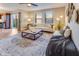 Spacious living room featuring hardwood floors, plenty of natural light, and a stylish rug at 341 Thistlewood Dr, Greenfield, IN 46140