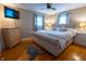 Cozy bedroom features a plush bed, natural light, and classic furnishings for a peaceful retreat at 37 E Waterbury Rd, Indianapolis, IN 46227