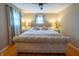 Comfortable bedroom with a cushioned bed frame and neutral décor at 37 E Waterbury Rd, Indianapolis, IN 46227