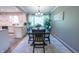Open dining area with stylish table, chairs, modern lighting, and plant accents at 37 E Waterbury Rd, Indianapolis, IN 46227