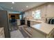 Bright kitchen with modern appliances and an open layout to the living area at 37 E Waterbury Rd, Indianapolis, IN 46227