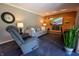 Stylish living room featuring a cozy sofa and fireplace, perfect for relaxation at 37 E Waterbury Rd, Indianapolis, IN 46227