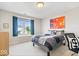 Stylish bedroom with large window, comfortable bed, and modern decor at 3711 Pete Dye Blvd, Carmel, IN 46033