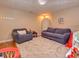 Spacious basement with comfortable seating, a play area, and ample room to relax at 3903 Junco Cir, Indianapolis, IN 46228