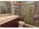 Modern bathroom featuring a glass shower and a sleek, floating vanity at 3903 Junco Cir, Indianapolis, IN 46228