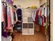 Walk-in closet with ample storage shelves and hanging racks for organized storage at 3903 Junco Cir, Indianapolis, IN 46228