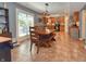 Eat-in kitchen featuring warm oak cabinets, tile floor, and plenty of seating for the whole Gathering at 3903 Junco Cir, Indianapolis, IN 46228
