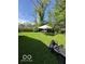 Lush backyard featuring ample green space at 4014 Arquette Dr, Indianapolis, IN 46235