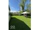 Lush backyard featuring ample green space at 4014 Arquette Dr, Indianapolis, IN 46235