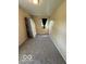 Bedroom featuring neutral carpet, a small window, and a mattress at 4014 Arquette Dr, Indianapolis, IN 46235