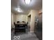 Dining area featuring table and chairs, and luxury vinyl plank flooring, in neutral colored paint at 4014 Arquette Dr, Indianapolis, IN 46235