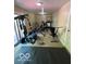 Spacious gym with various exercise machines and ample workout space at 4014 Arquette Dr, Indianapolis, IN 46235