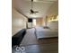 Vaulted ceiling, main bedroom with soft carpet, and vaulted windows at 4014 Arquette Dr, Indianapolis, IN 46235