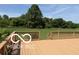 Wooden deck with wooden railing overlooking serene backyard at 4680 Cartersburg Rd, Plainfield, IN 46168