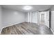Bedroom with neutral paint, open closet and hard surface floors at 5512 Lunsford Dr, Indianapolis, IN 46237