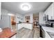 Bright kitchen with white cabinets, wood countertops, and stainless steel appliances at 5512 Lunsford Dr, Indianapolis, IN 46237