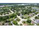 Aerial view of a neighborhood with tree-lined streets and well-maintained homes, showcasing community layout at 5640 Dapple Ct, Indianapolis, IN 46228