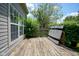 Backyard deck area overlooking greenery and a partial fence at 5640 Dapple Ct, Indianapolis, IN 46228