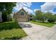 Charming brick two-story home with a well-maintained lawn and a concrete driveway at 5640 Dapple Ct, Indianapolis, IN 46228