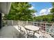 Outdoor deck featuring decorative metal furniture, ideal for entertaining and enjoying scenic views at 6254 Grosbeak Ct, Nineveh, IN 46164