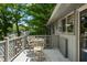 A charming outdoor deck offers the perfect spot to relax and enjoy the surrounding greenery at 6254 Grosbeak Ct, Nineveh, IN 46164