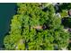 Aerial perspective displaying the layout of a house amid dense green foliage at 6300 Grouse Dr, Nineveh, IN 46164