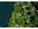 Overhead view with property lines of a house hidden amongst vibrant green trees at 6300 Grouse Dr, Nineveh, IN 46164