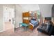 Bright bedroom boasts a wooden bunk bed, a window with a lake view, and a futon at 6300 Grouse Dr, Nineveh, IN 46164